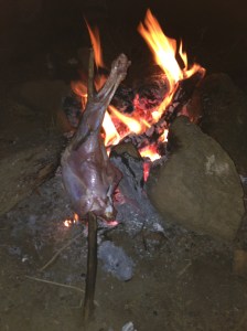Barbecuing some goat leg.
