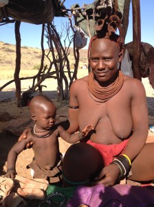 Himba woman.  The fur headdress means that she is married.